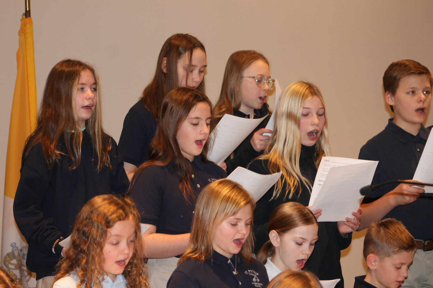 Members of the contemporary choir of St. Peter School in Jefferson City lead the singing at the Saturday evening Vigil Mass in St. Andrew Church in Holts Summit Jan. 27, as Catholic Schools Week got under way. This year’s theme is “Catholic Schools: United in Faith and Community.”